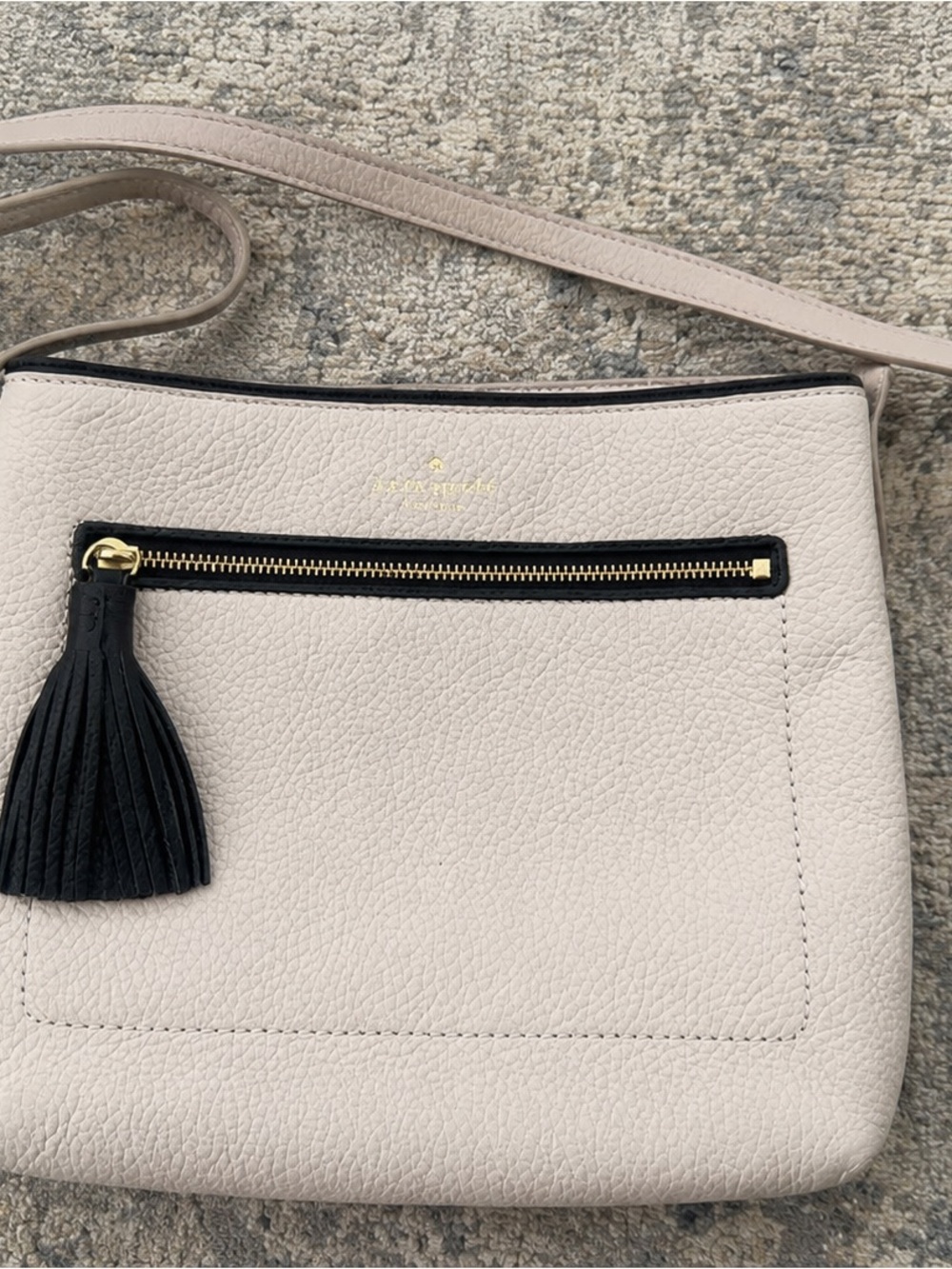 kate spade Pebbled Crossbody in Light Beige with Black Tassel